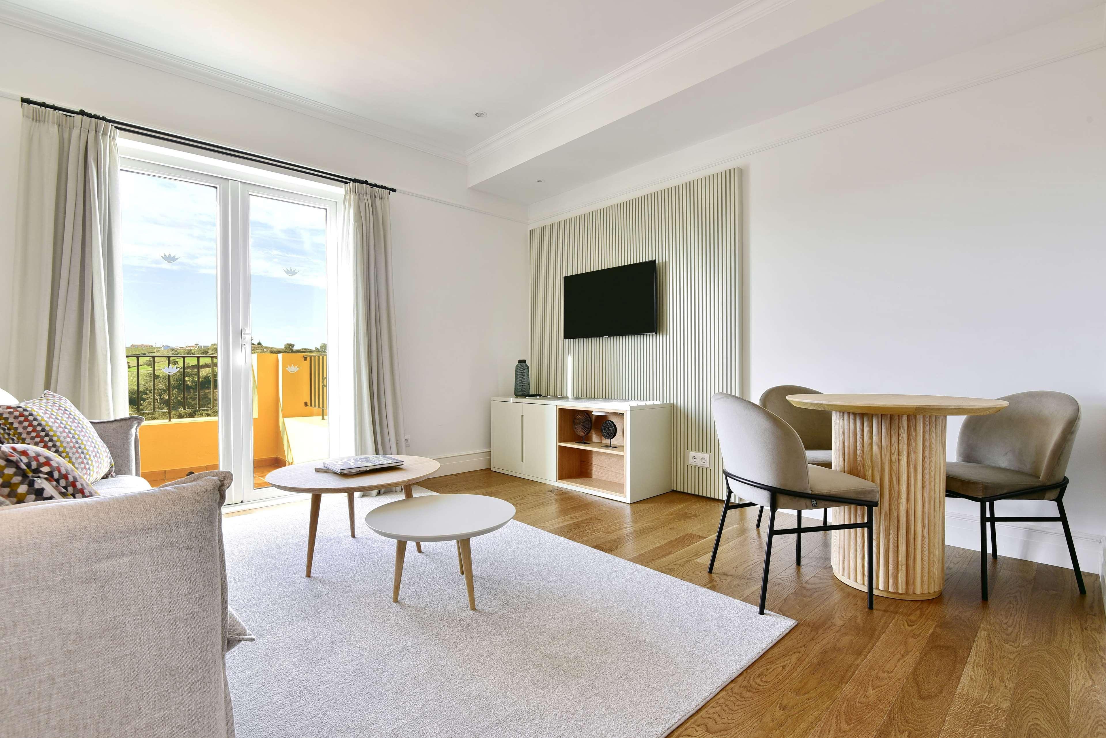 Dolce Camporeal Lisboa Turcifal Exterior photo A living room at The Ivy Collection